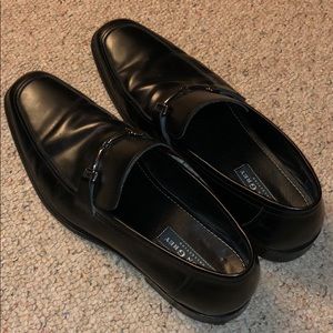 Black leather dress shoes.